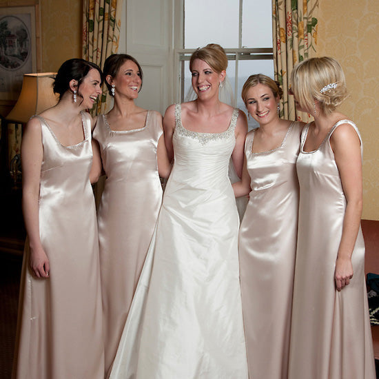 Amy's bridesmaids wear Forties Beauty Earrings and Sparkling Charm Hair Combs by Glitzy Secrets