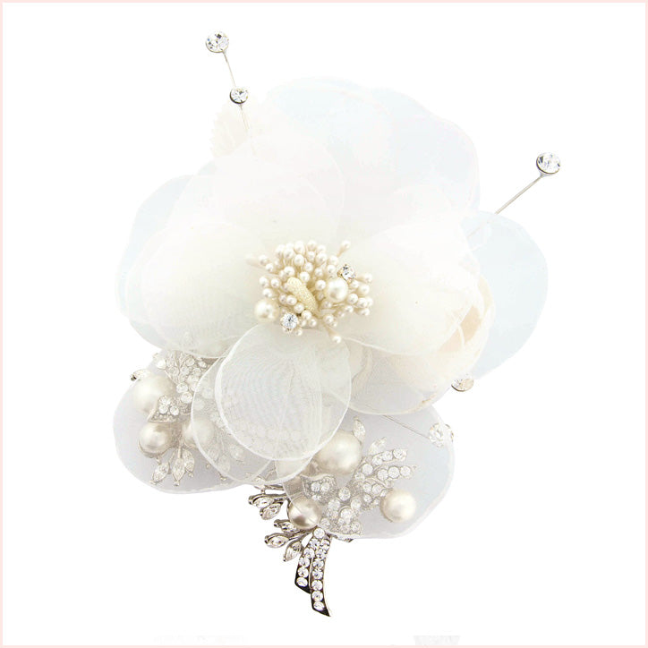 Wedding hair flowers adorned with pearls